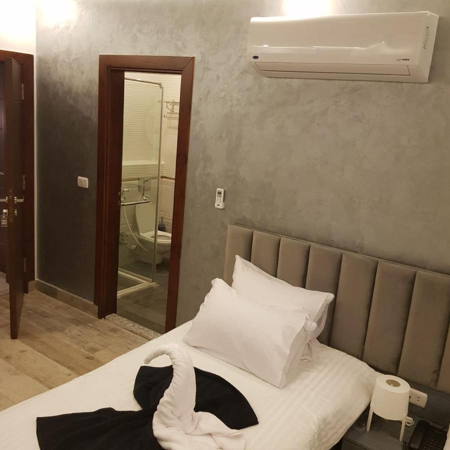Cleopatra Pyramids View Hotel Kafret el-Gabal Esterno foto